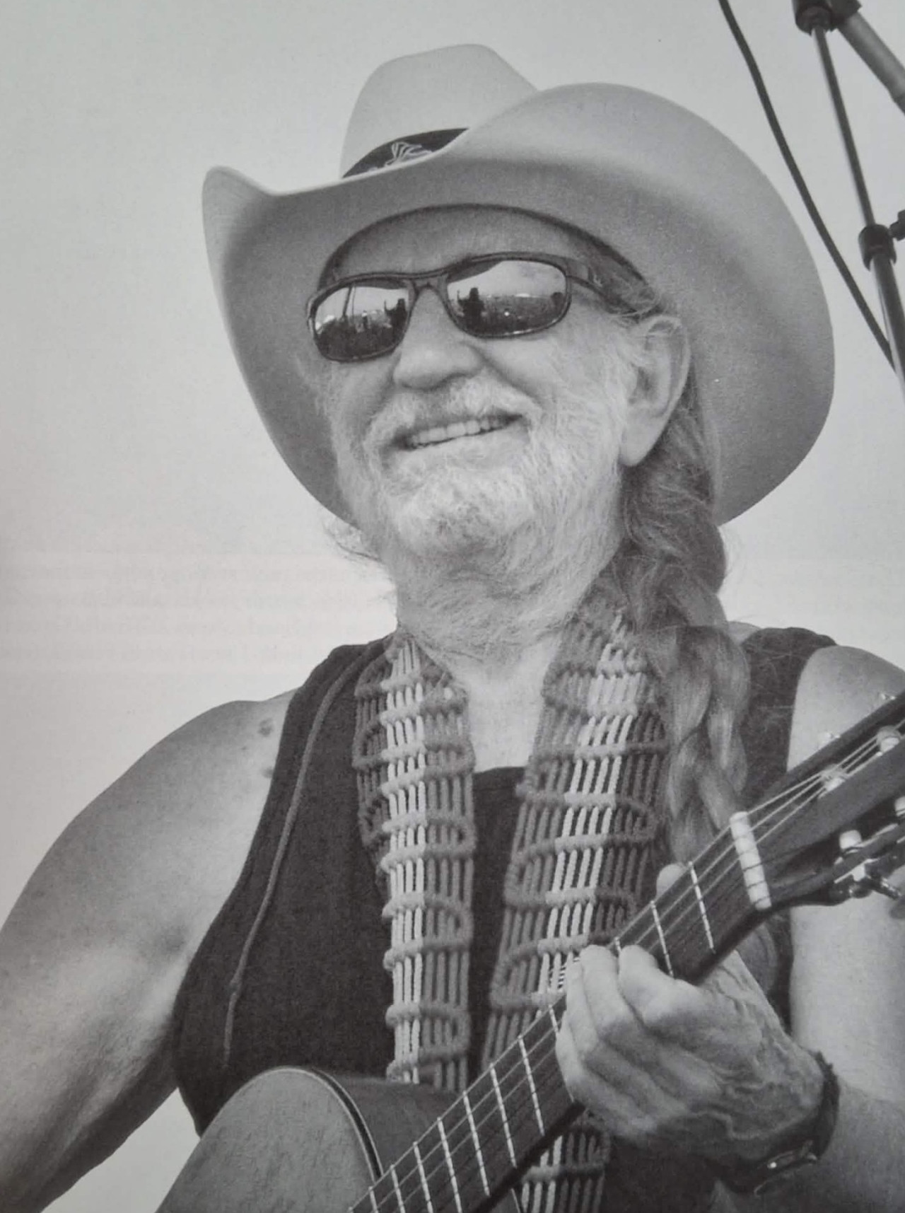 Folkový country zpěvák Willie Nelson.